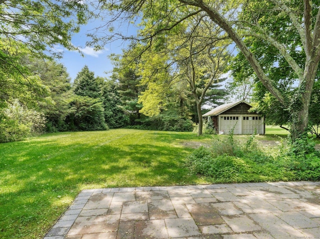 355 Main St, Old Saybrook, CT 06475 - view of green lawn with a detached garage and an outdoor structure