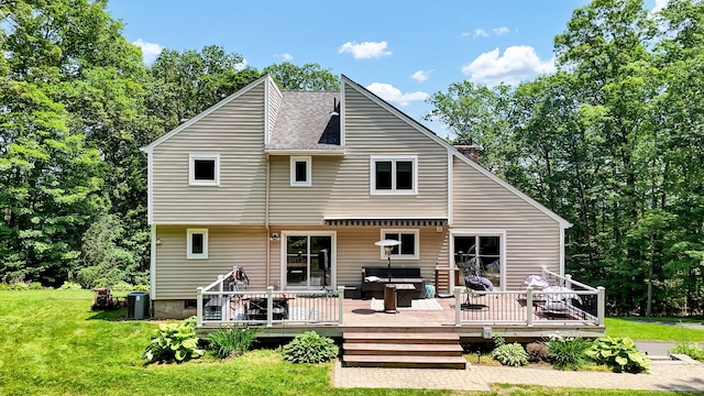 2 Pent Rd, Bloomfield, CT 06002 - back of property with a yard, a chimney, a deck, and a shingled roof