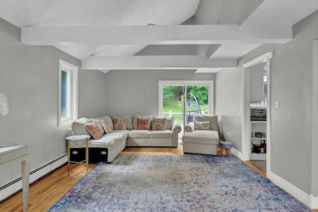 2 Pent Rd, Bloomfield, CT 06002 - living room featuring wood finished floors and a baseboard heating unit