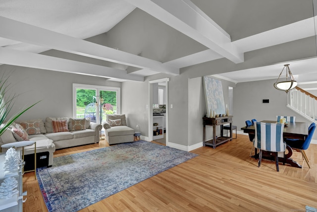 2 Pent Rd, Bloomfield, CT 06002 - living area with wood finished floors, stairway, and beam ceiling