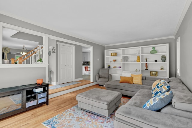 2 Pent Rd, Bloomfield, CT 06002 - living area with wood finished floors, crown molding, and stairway