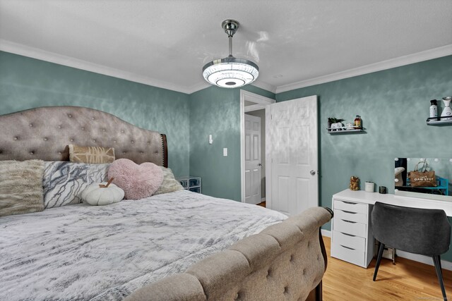 2 Pent Rd, Bloomfield, CT 06002 - bedroom with light wood-type flooring and crown molding