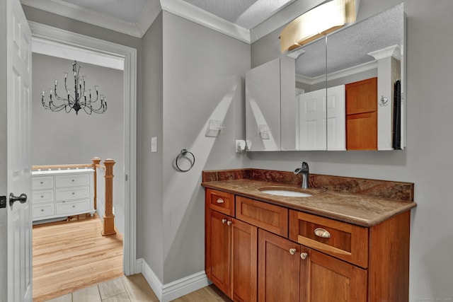 2 Pent Rd, Bloomfield, CT 06002 - bathroom featuring vanity, crown molding, and a textured ceiling