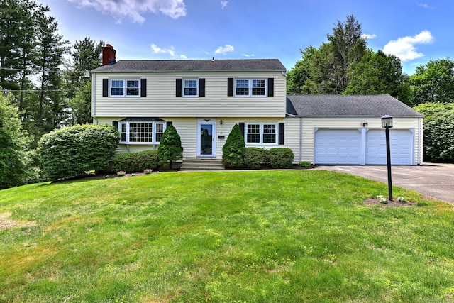 64 Regina St, Trumbull, CT 06611 - colonial inspired home with a garage, driveway, a chimney, a front yard, and entry steps
