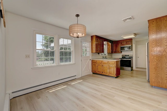 64 Regina St, Trumbull, CT 06611 - kitchen featuring appliances with stainless steel finishes, light wood-style floors, light countertops, baseboard heating, and plenty of natural light