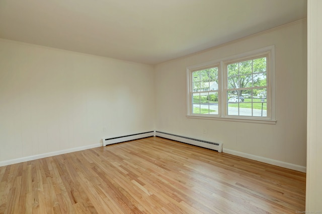 64 Regina St, Trumbull, CT 06611 - empty room featuring light wood finished floors, crown molding, and baseboards