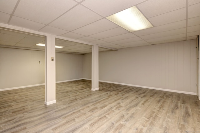 64 Regina St, Trumbull, CT 06611 - finished basement featuring wood finished floors, a paneled ceiling, and baseboards