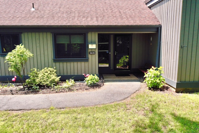 133 Heritage Vlg Unit B, Southbury, CT 06488 - view of exterior entry with a shingled roof