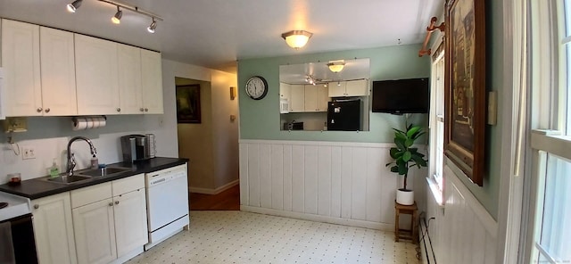 33 Bristol Dr, Canton, CT 06019 - kitchen featuring dishwasher, a sink, refrigerator, a wainscoted wall, and white cabinetry