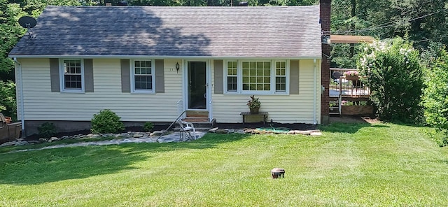 33 Bristol Dr, Canton, CT 06019 - view of front of property with a chimney, a front yard, a wooden deck, entry steps, and a shingled roof