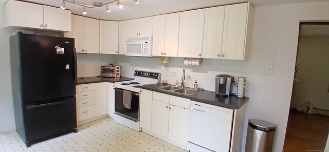 33 Bristol Dr, Canton, CT 06019 - kitchen featuring white appliances, a sink, dark countertops, and light flooring