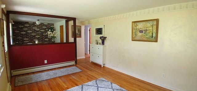 33 Bristol Dr, Canton, CT 06019 - unfurnished room with a baseboard radiator, wood finished floors, and baseboards