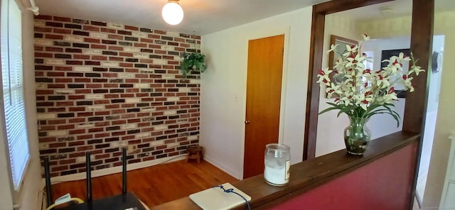 33 Bristol Dr, Canton, CT 06019 - detailed view of wood finished floors and brick wall