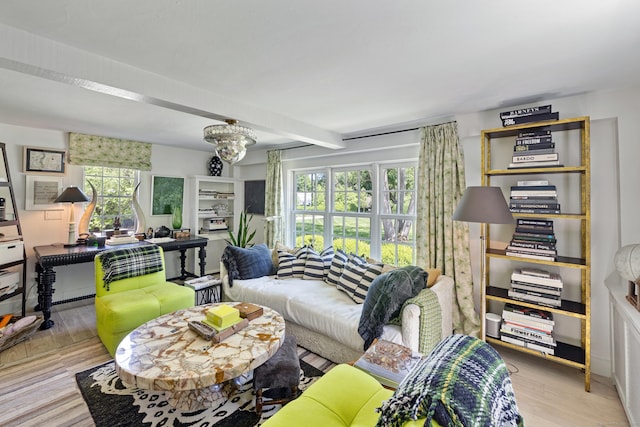 6 Over Rock Ln, Westport, CT 06880 - living area featuring plenty of natural light, wood finished floors, a chandelier, and beamed ceiling