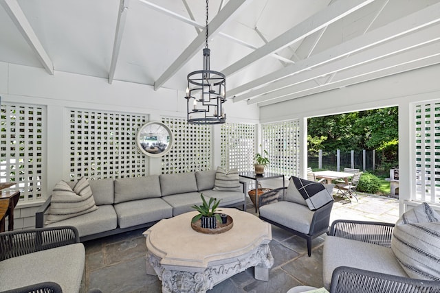 6 Over Rock Ln, Westport, CT 06880 - living room with a chandelier and stone finish flooring