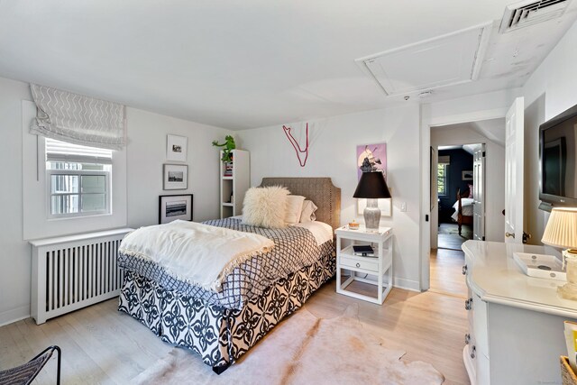 6 Over Rock Ln, Westport, CT 06880 - bedroom with radiator, light wood finished floors, attic access, and baseboards