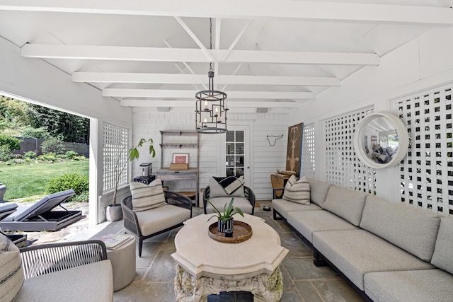 6 Over Rock Ln, Westport, CT 06880 - living room featuring beam ceiling and stone finish floors