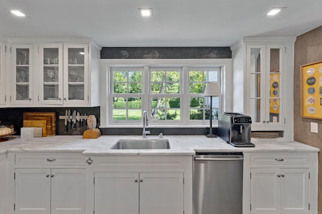 6 Over Rock Ln, Westport, CT 06880 - kitchen with a sink, dishwasher, and white cabinetry