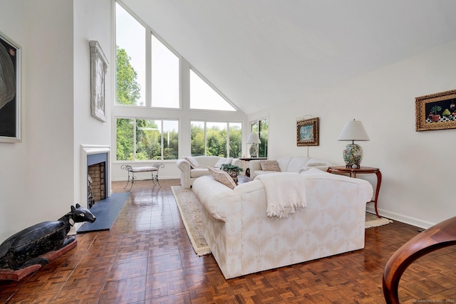 76 Farview Farm Rd, Redding, CT 06896 - living area featuring healthy amount of natural light, high vaulted ceiling, and a fireplace with raised hearth