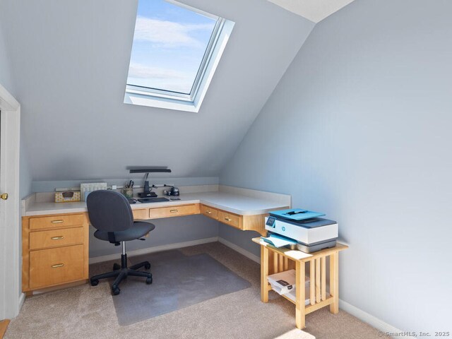 152 Hollyberry Rd, Bristol, CT 06010 - office space with light colored carpet, built in desk, a skylight, and lofted ceiling