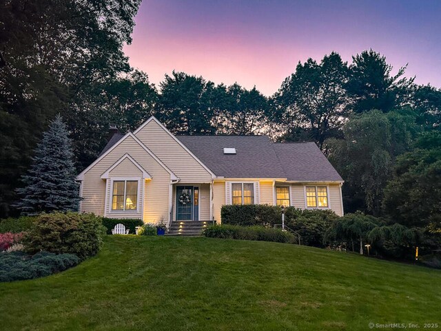 152 Hollyberry Rd, Bristol, CT 06010 - view of front of house featuring a yard and a chimney