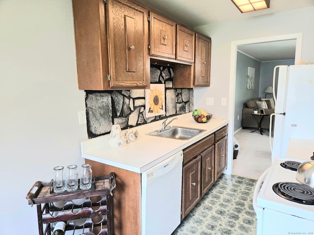 7 Bayberry Ct Unit 7, Cromwell, CT 06416 - kitchen featuring white appliances, a sink, backsplash, light countertops, and baseboards