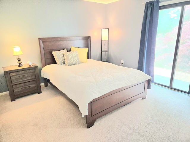 7 Bayberry Ct Unit 7, Cromwell, CT 06416 - bedroom featuring light carpet and access to exterior