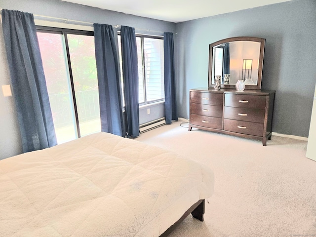 7 Bayberry Ct Unit 7, Cromwell, CT 06416 - bedroom with light carpet, baseboard heating, and baseboards