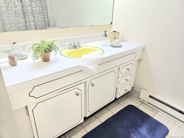 7 Bayberry Ct Unit 7, Cromwell, CT 06416 - bathroom with baseboard heating, tile patterned flooring, and vanity