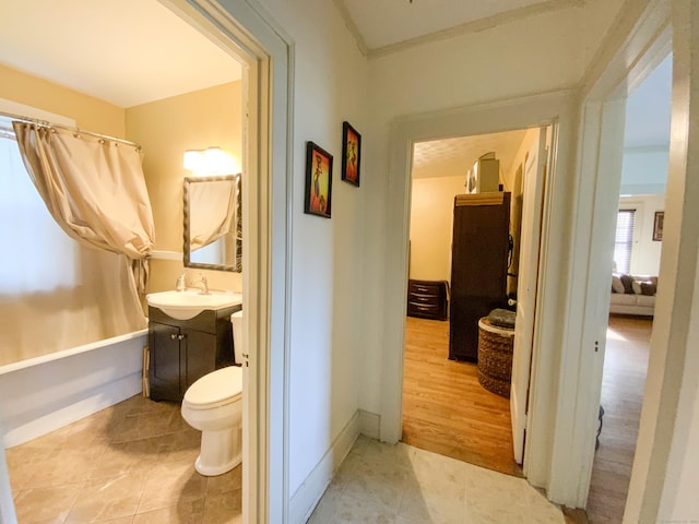 240 Martin St, Hartford, CT 06120 - full bathroom featuring vanity, shower / tub combo with curtain, toilet, baseboards, and tile patterned flooring