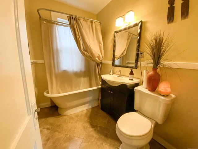 240 Martin St, Hartford, CT 06120 - full bathroom with toilet, vanity, tile patterned floors, and shower / bath combo