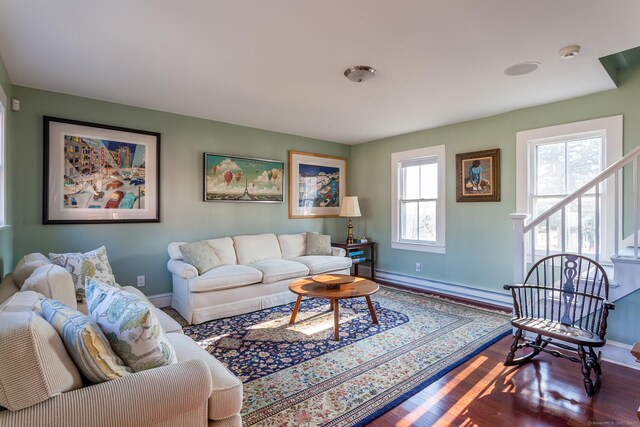 163 Lake Rd, Warren, CT 06754 - living room with a baseboard radiator, baseboards, and wood finished floors