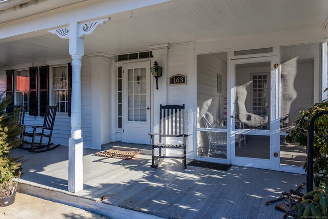 163 Lake Rd, Warren, CT 06754 - doorway to property featuring a porch