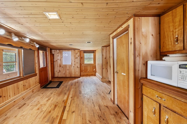 46 Bellamy Ln, Bethlehem, CT 06751 - entryway with light wood-style flooring, wood ceiling, and wooden walls