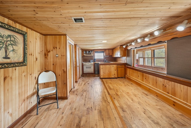 46 Bellamy Ln, Bethlehem, CT 06751 - kitchen with stainless steel dishwasher, wood walls, white range, light wood-type flooring, and wood ceiling