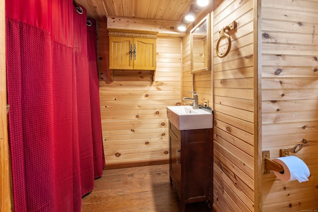 46 Bellamy Ln, Bethlehem, CT 06751 - full bath featuring vanity, wood finished floors, wooden ceiling, and wood walls