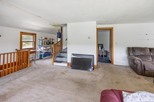 46 Bellamy Ln, Bethlehem, CT 06751 - carpeted living room with vaulted ceiling and baseboards