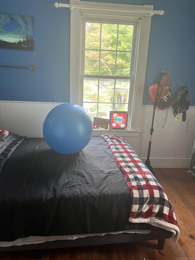 66 S 3rd St, Meriden, CT 06451 - bedroom with wood-type flooring and wainscoting