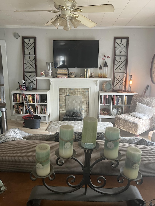 66 S 3rd St, Meriden, CT 06451 - living area with crown molding, a tile fireplace, and a ceiling fan