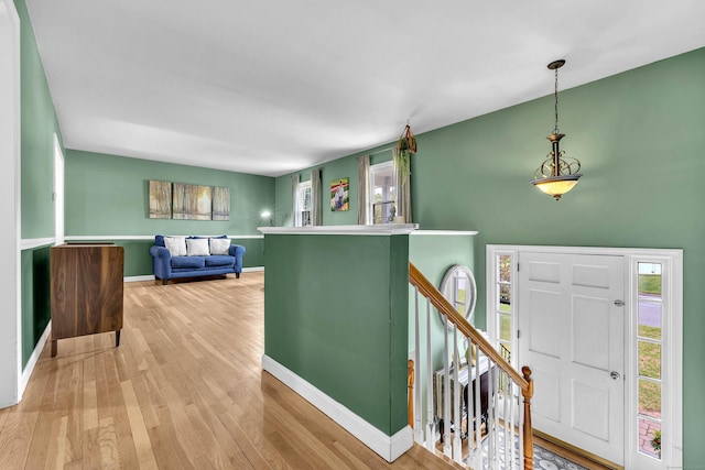25 Meadow Dr, Ledyard, CT 06335 - foyer entrance featuring plenty of natural light, baseboards, and wood finished floors