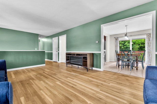 25 Meadow Dr, Ledyard, CT 06335 - living area with wood finished floors and baseboards