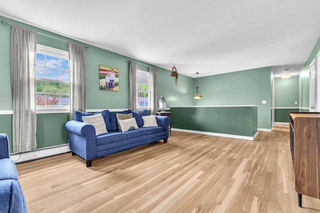 25 Meadow Dr, Ledyard, CT 06335 - living room featuring baseboard heating, wood finished floors, and baseboards