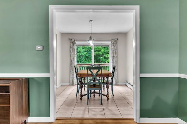 25 Meadow Dr, Ledyard, CT 06335 - dining room with baseboard heating, tile patterned flooring, and baseboards