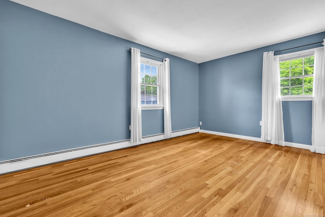 25 Meadow Dr, Ledyard, CT 06335 - unfurnished room with healthy amount of natural light, light wood-style floors, and baseboards