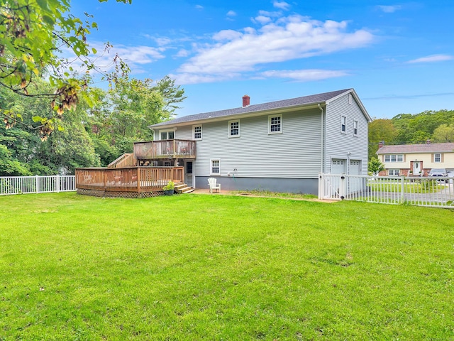 25 Meadow Dr, Ledyard, CT 06335 - rear view of house with a garage, a wooden deck, and a chimney