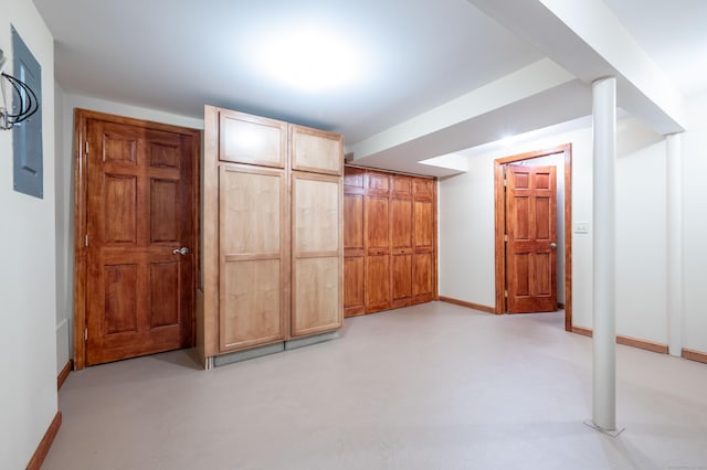 55 Mill Plain Rd Unit 6-3, Danbury, CT 06811 - unfurnished bedroom featuring baseboards and concrete floors
