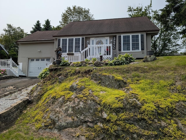 101 Chipper Rd, Waterbury, CT 06704 - ranch-style home featuring a garage and asphalt driveway