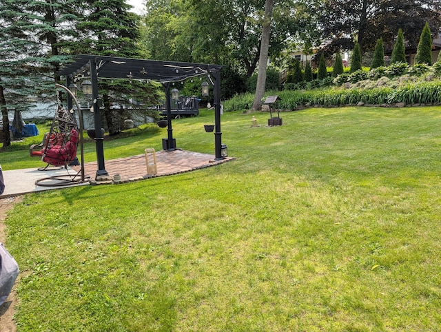 101 Chipper Rd, Waterbury, CT 06704 - view of grassy yard featuring a pergola and a patio