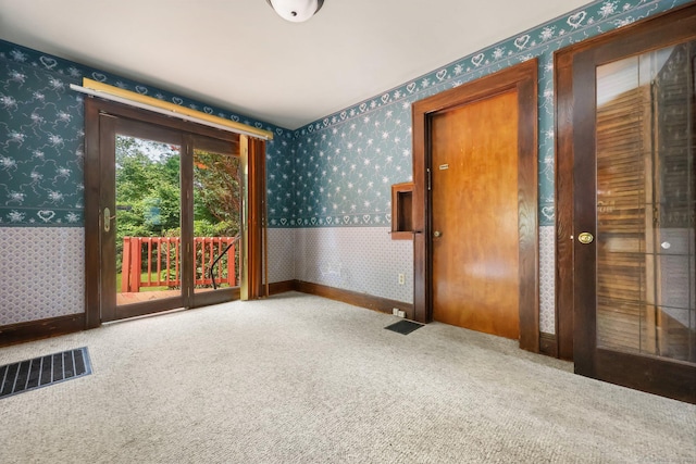 283 Derby Ave, Orange, CT 06477 - carpeted spare room featuring wallpapered walls and baseboards