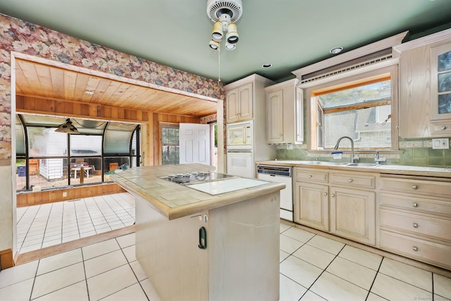 283 Derby Ave, Orange, CT 06477 - kitchen featuring tile counters, white appliances, light tile patterned flooring, cream cabinetry, and wooden ceiling